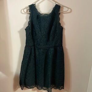 Lace dress with scalloped edges